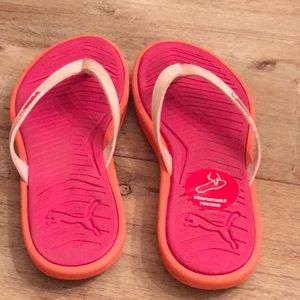 GUC pink and orange puma flip flops